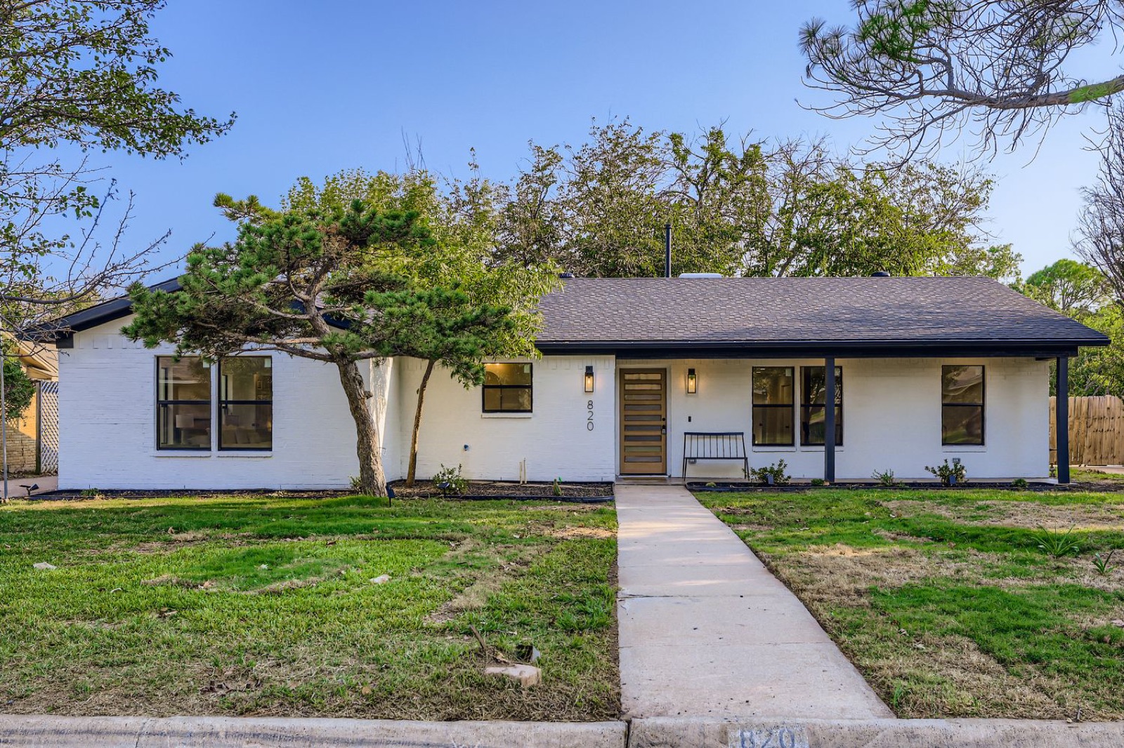 Restored front exterior of a Denton, TX home after restoration