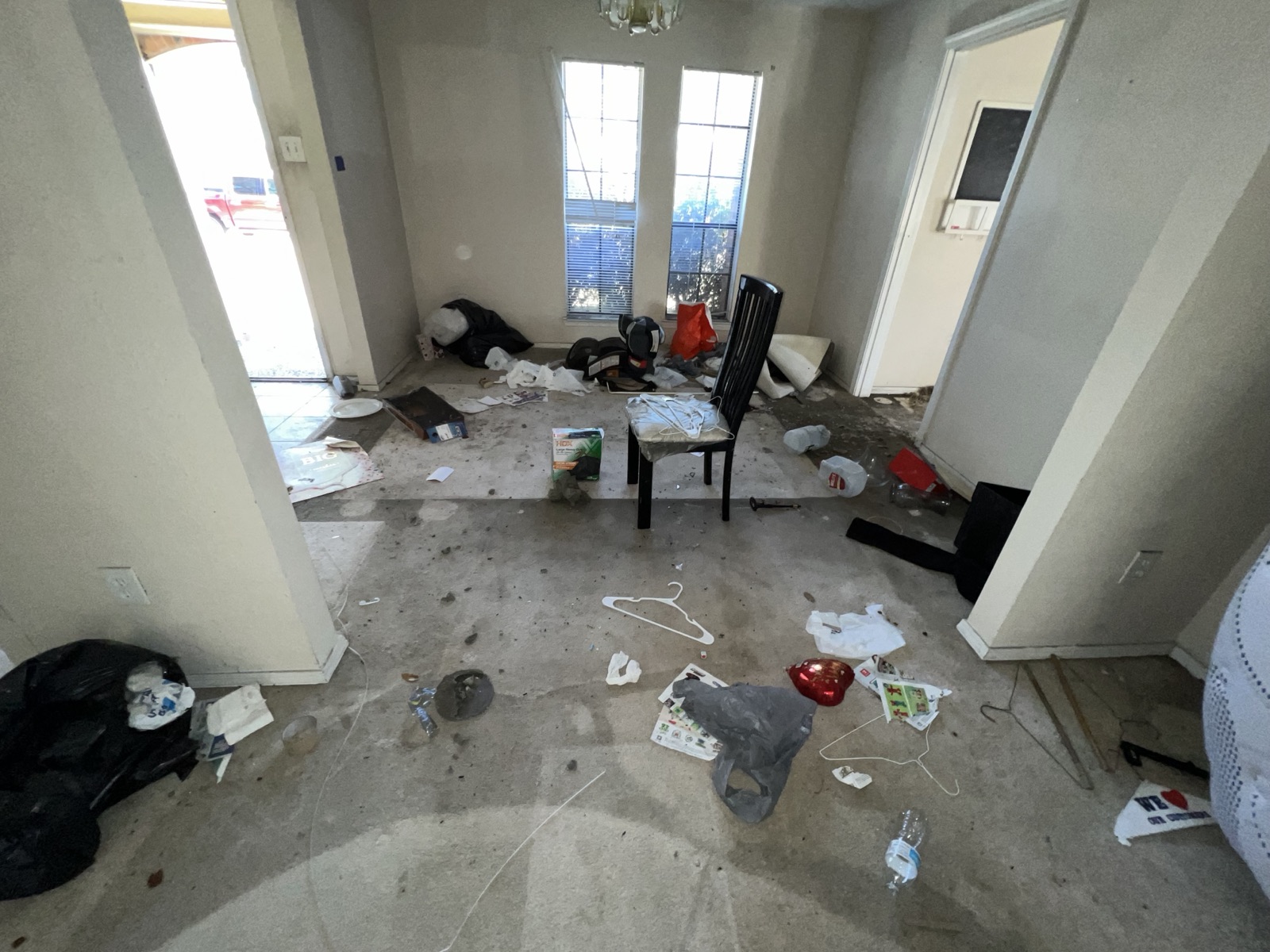 Fire damaged dining room in a Plano, TX home before restoration