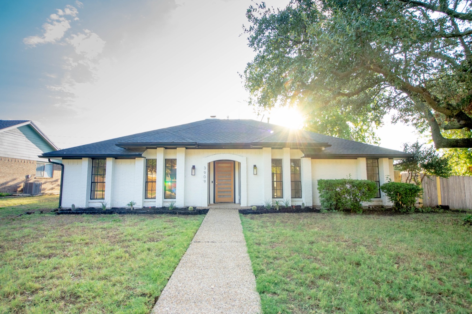 Restored front exterior of a Plano, TX home after restoration
