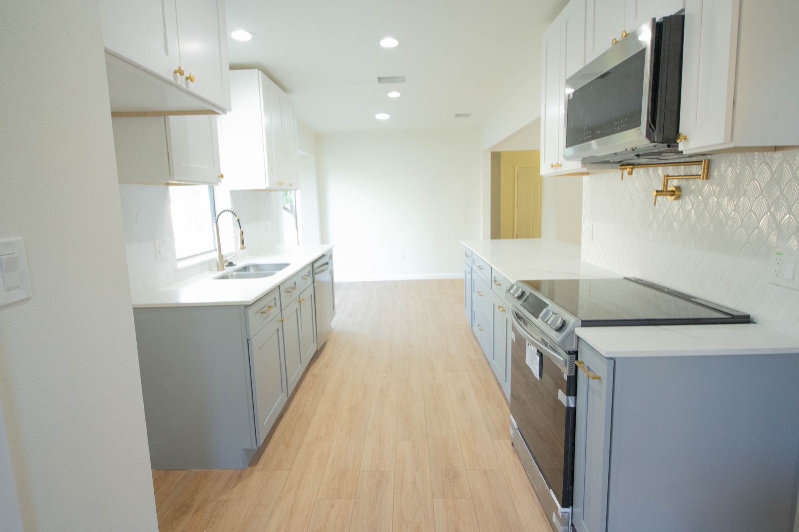 Fully restored kitchen in a Plano, TX fire-damaged home