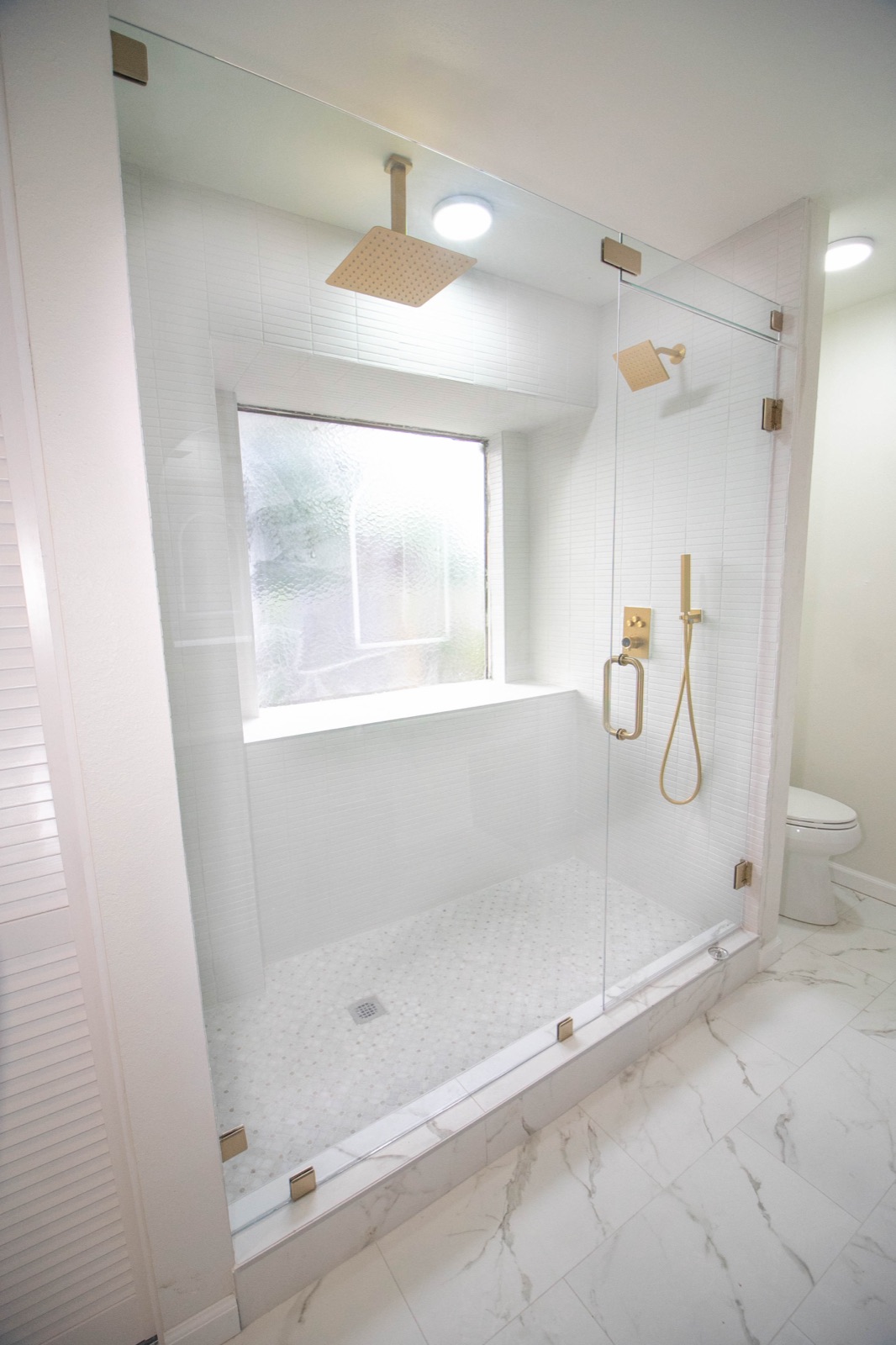 Restored primary bathroom in a Plano, TX home after restoration
