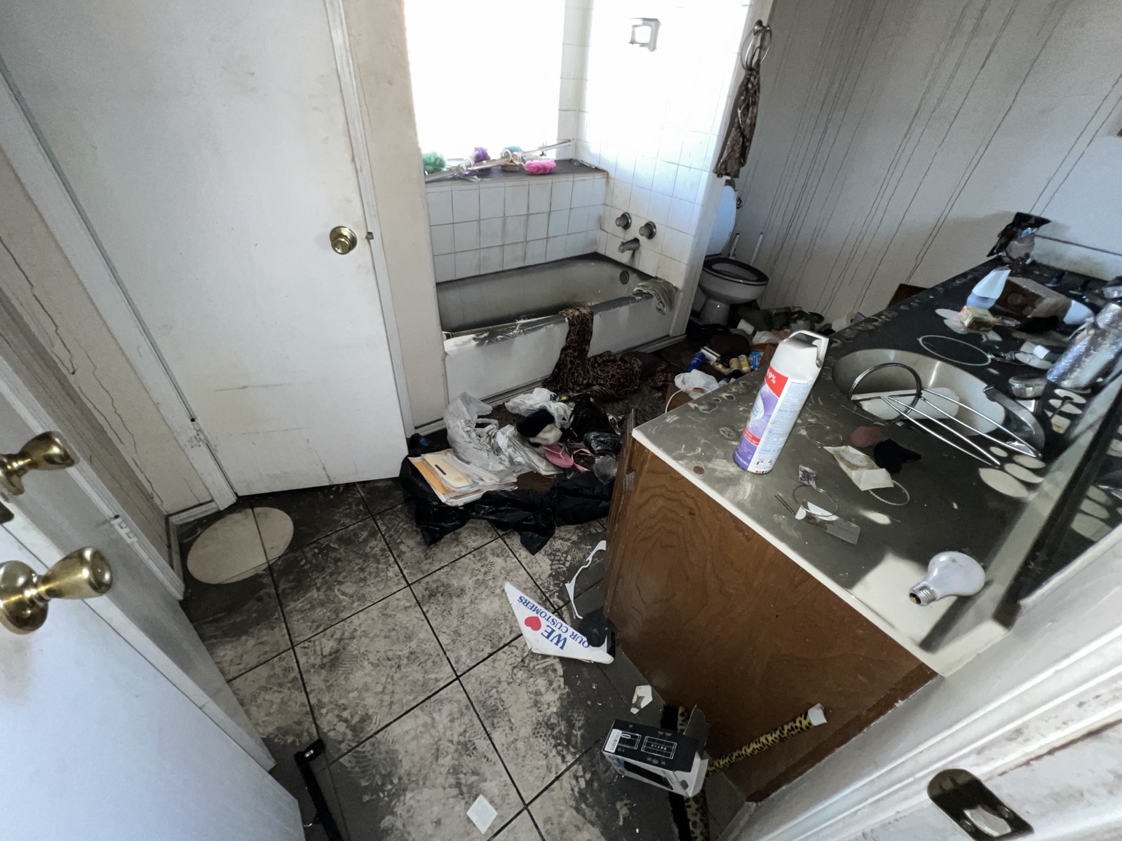 Fire damaged primary bathroom in a Plano, TX home before restoration
